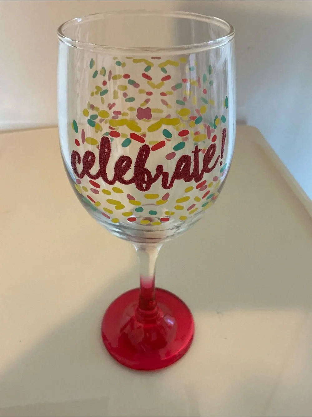 Hand Painted Celebrate Pink Stemmed Wine Glass with colorful Confetti Design